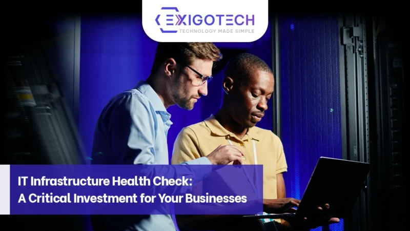 IT professionals examining server equipment during an IT Infrastructure Health Check, presented by Exigo Tech. The blog post highlights the critical importance of regular health checks for business IT systems.