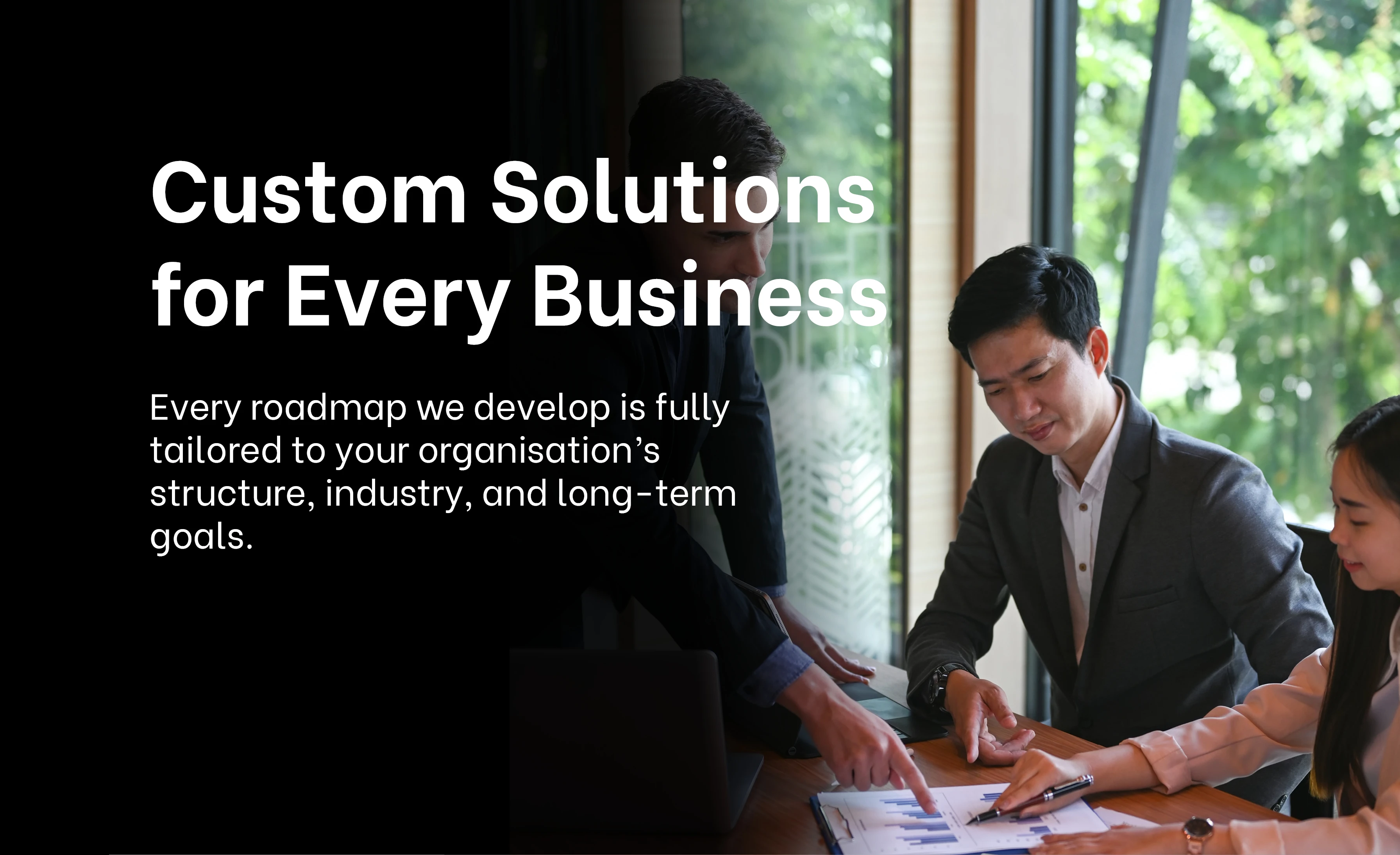 Customised Solutions | Business professionals collaborating on custom solutions, representing tailored strategies for every business at Exigo Tech Australia